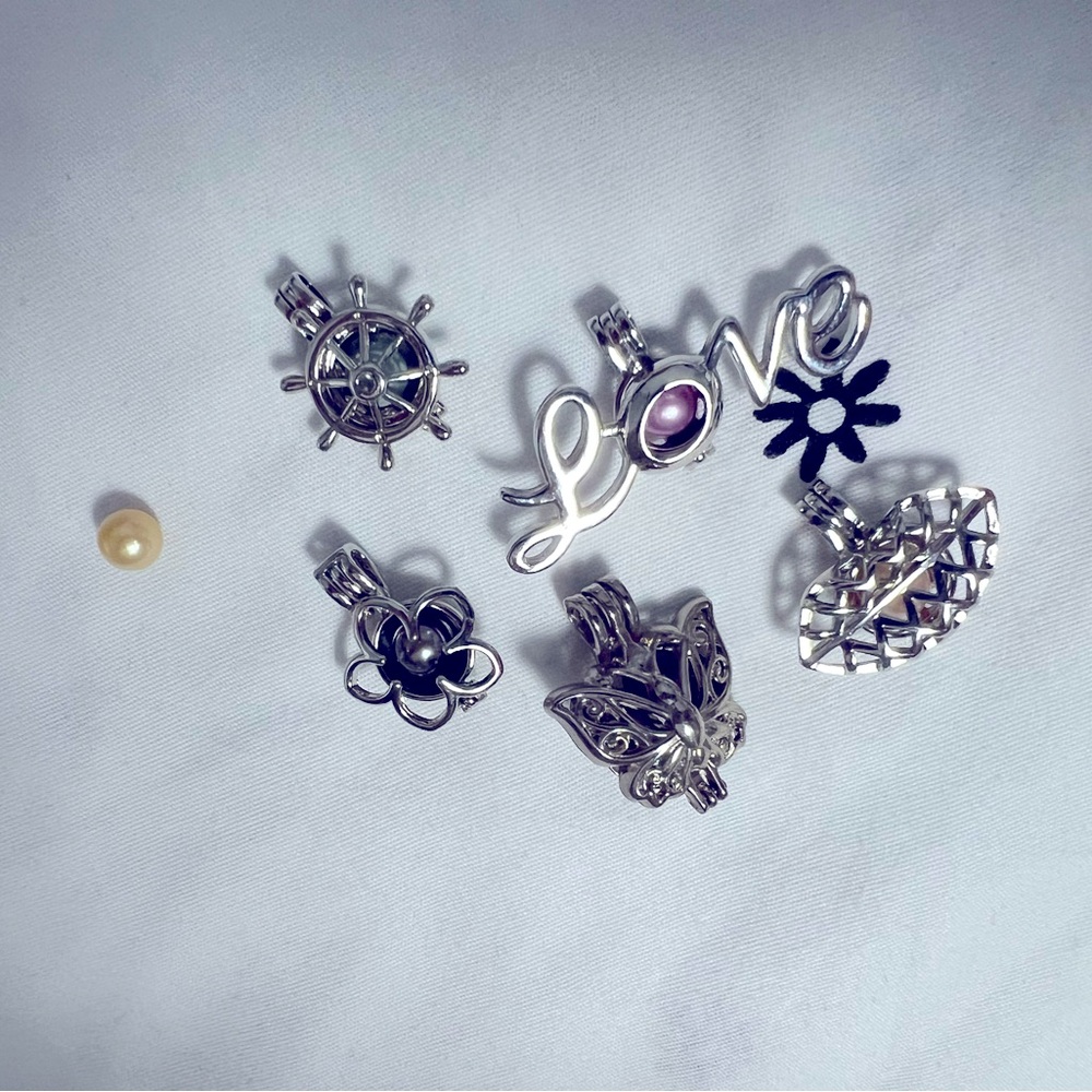 Real pearls and necklace sterling silver charms with chain